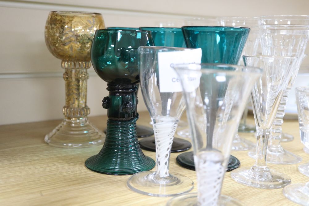 A collection of green glass and cut glass
